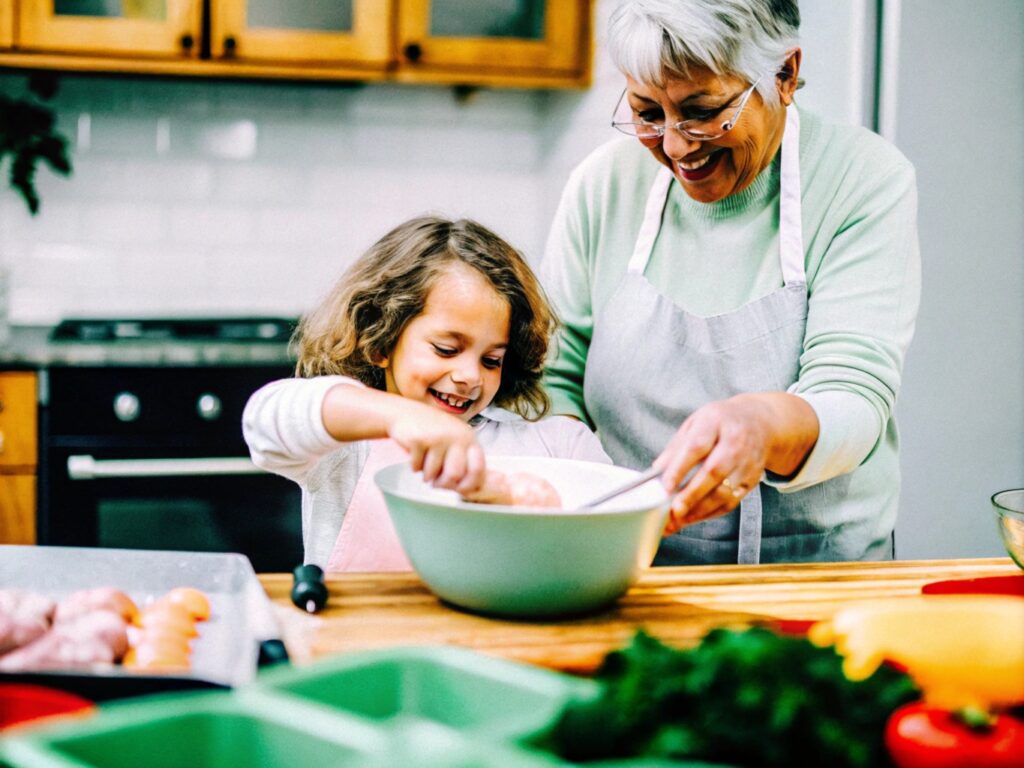 A grandmother and child joyfully preparing chicken dressing together in a warm, inviting kitchen with a cozy atmosphere